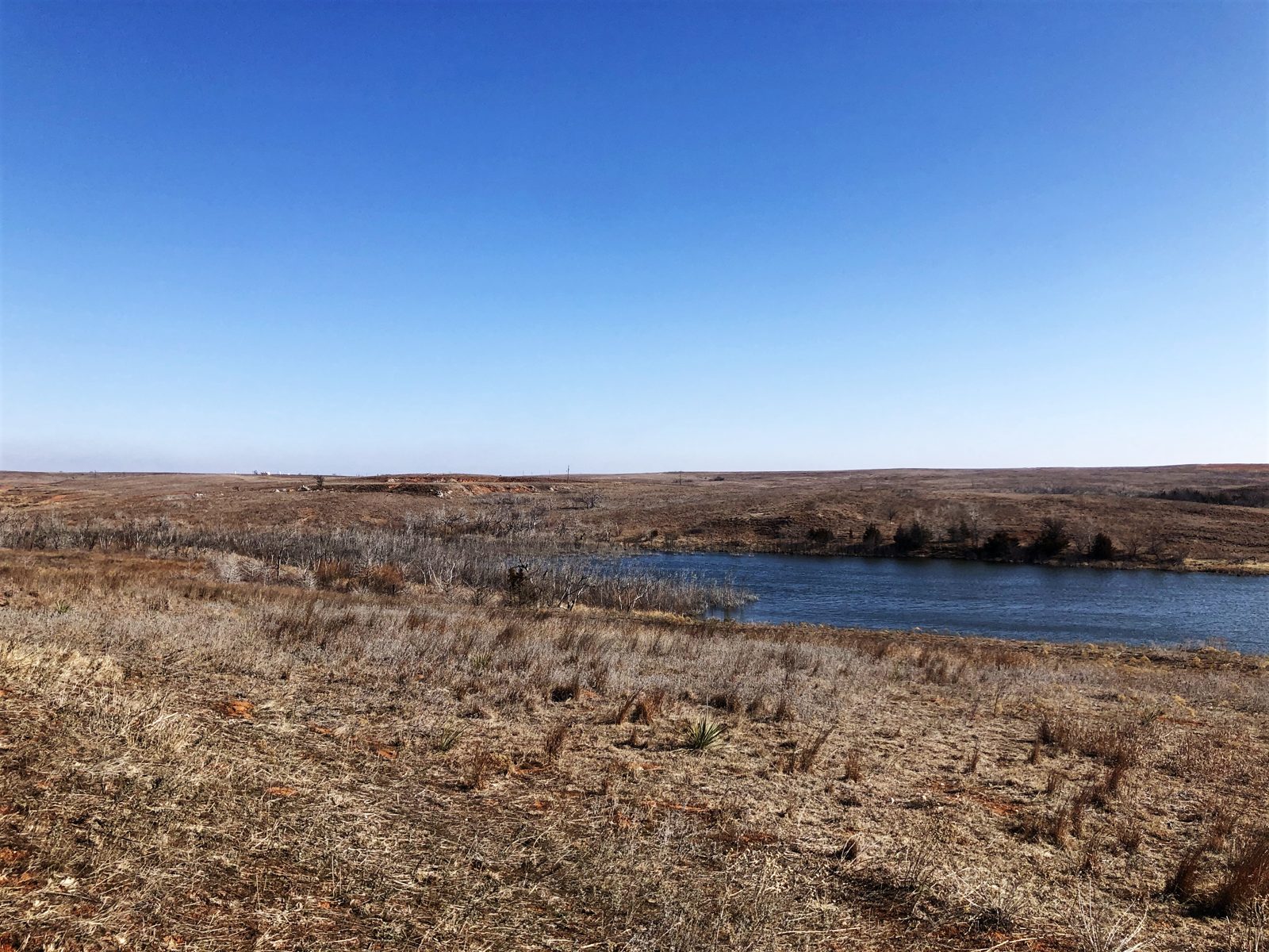 Oklahoma rangeland and pond during a field investigation